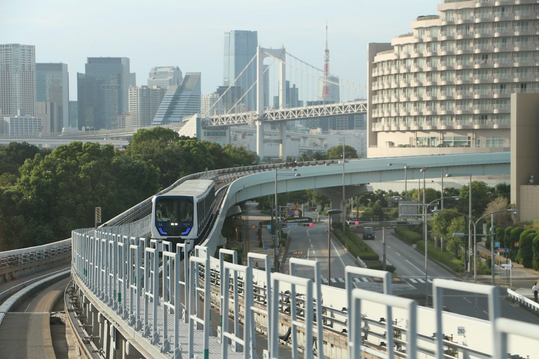 Elevated Japanese train in Tokyo illustrating the airport monorail route