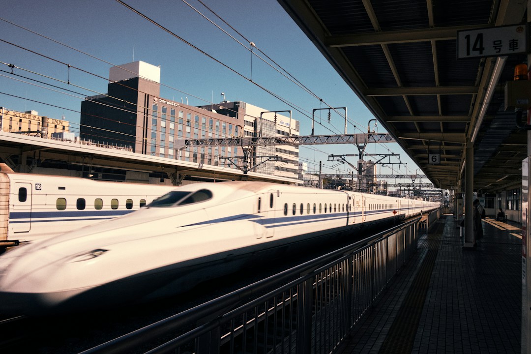 Shinkansen arriving at a Kyoto station platform in Japan