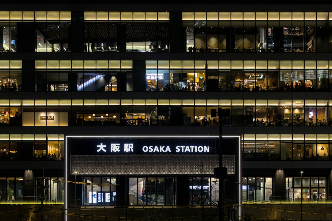 Osaka Station at night, illustrating arrival options for travelers staying around Umeda and central Osaka